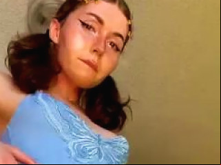 ASHEMALETUBE @ A Young Transgender Woman Wearing Blue Clothing And Emitting Semen